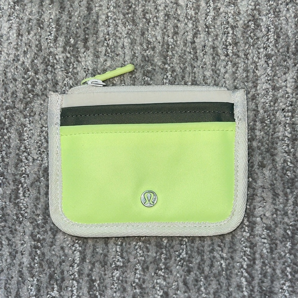 Neon yellow/greenish Lululemon wallet
